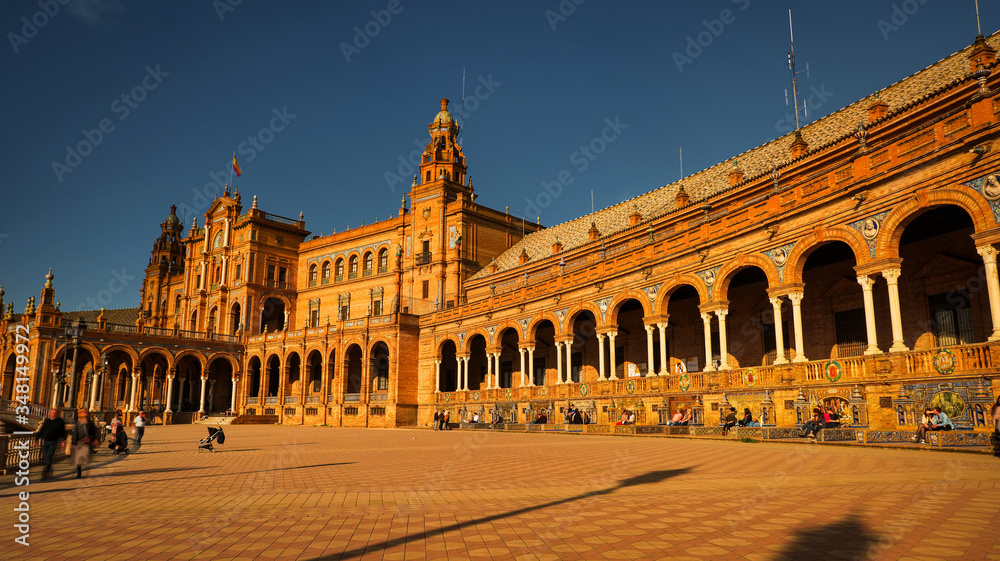 Seville, Spain - February 18th, 2020 - The tiled Provincial Alcoves along the walls of Plaza de España /Spain Square in Seville City Center, Spain.