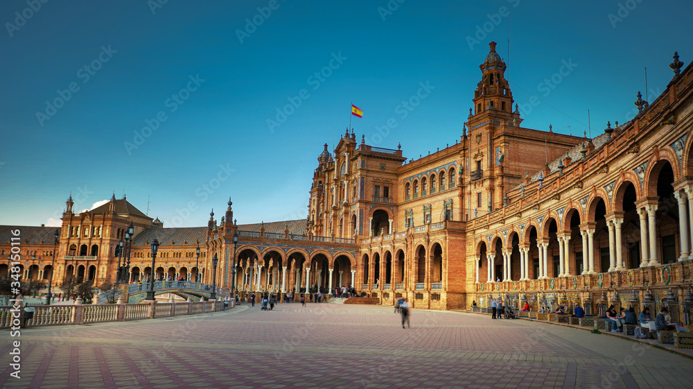 Seville, Spain - February 20th, 2020 - The Plaza de España / Spain Square with beautiful view to the Pavilion buildings within the Square in Seville City Center.