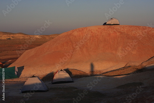 Wild camping in the red canyon  tents  natural colors  evening