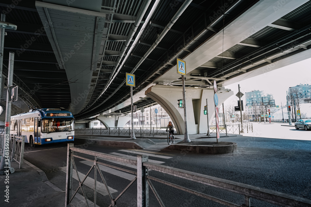 Architecture of the bridge, the Betancourt Bridge in Saint Petersburg, beautiful metal beams, a busy street with traffic lights, space under the bridge Architecture of the bridge, the Betancourt Bridge in Saint Petersburg, beautiful metal beams, a busy street with traffic lights, space under the bridge