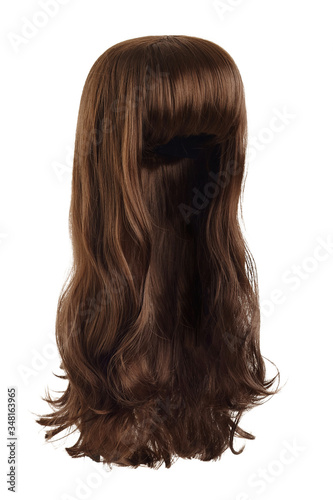 Subject shot of a natural looking brown wig with bangs and wavy strands. The long wig is isolated on the white background. 
