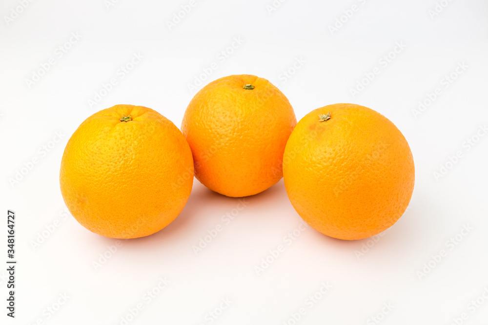 Fresh oranges on white background Fresh oranges on white background