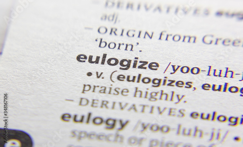 Eulogize word or phrase in a dictionary.