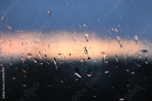 Background. Rain drops on glass.