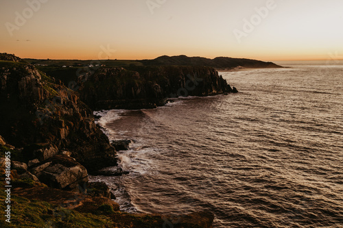 A view of the cliffs of Morgan Bay in the Easter Cape of South Africa at Sunrise over the Indian ocean. 