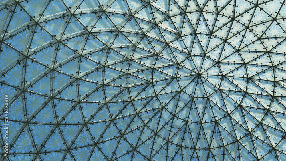 Glass roof cupola pattern formed by metal frame abstract background