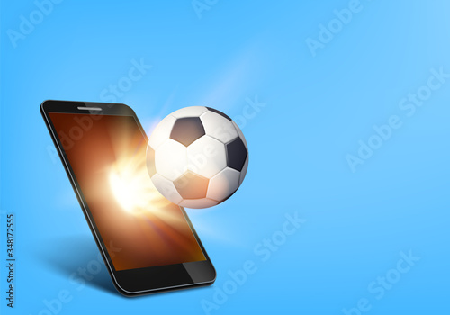 Soccer ball on fire flies out of the smartphone screen.