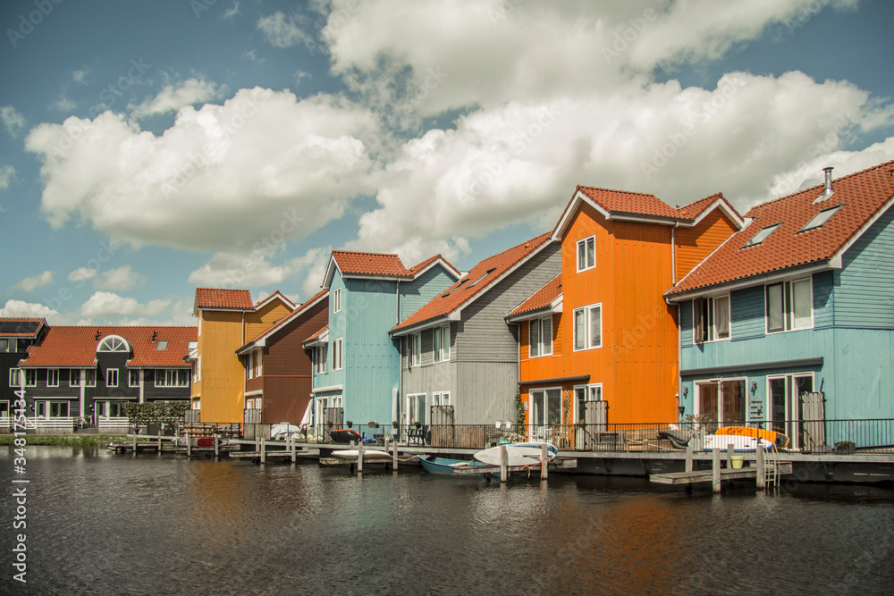 wooden houses on the river