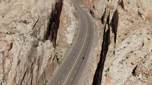 Aerial: Road going through The San Rafael Swell, a large geologic feature located in south-central Utah about 16 miles west of Green River, Utah.