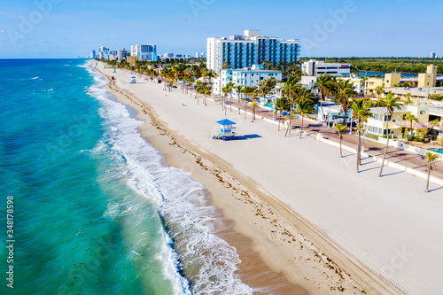 Aerial View of Hollywood Beach.Empty Beach.during COVID-19 .Lockdown, all Florida Beaches are closed to slow spread of the Corona Virus.Hollywood Beach Broadwalk..Hollywood, Broward,Florida,USA.. photo
