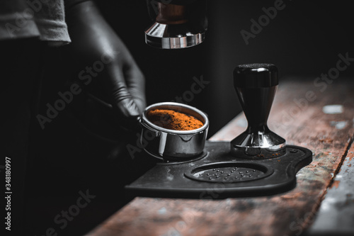 Close-up Baristas make espresso at home. Coffee Brewing Manual