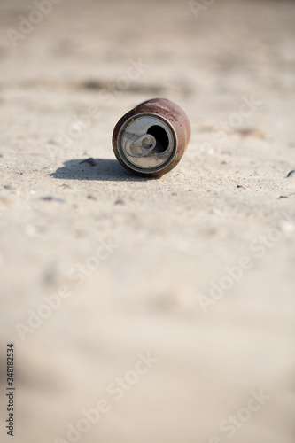 Rusty can on the beach