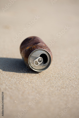 Rusty can on the beach