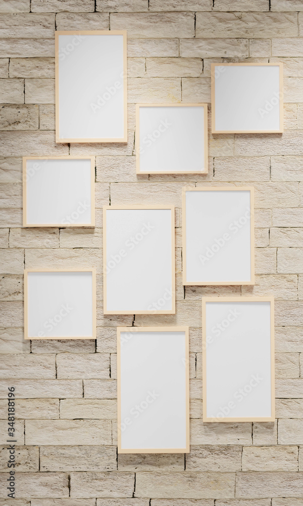 3D render illustration of multi size blank photo frames on the sand block bright wall. Empty picture frame mockup 3D render illustration of multi size blank photo frames on the sand block bright wall. Empty picture frame mockup