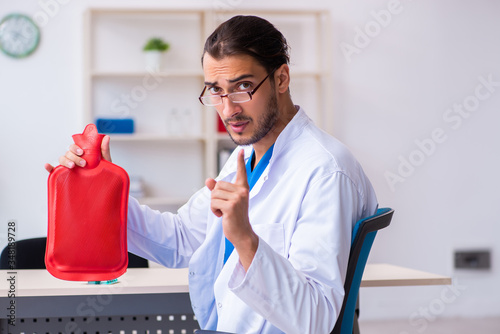 Canvas Print Young male doctor gastroenterologist working in the clinic