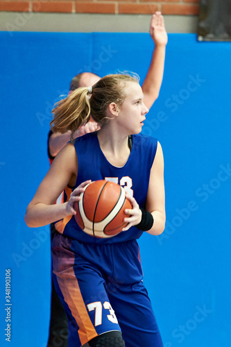 Girl play basketball
