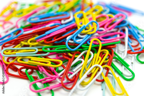 Collection of colorful Paper clips on white background