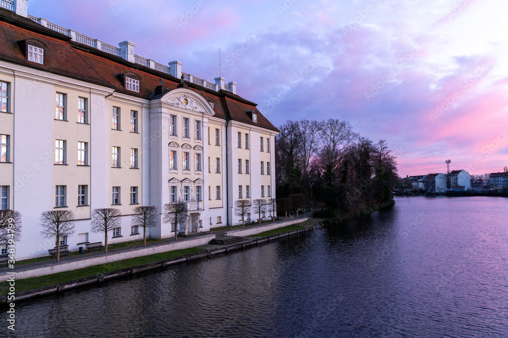Obraz premium Berlin Germany castle palace entrance on river in city district Köpenick