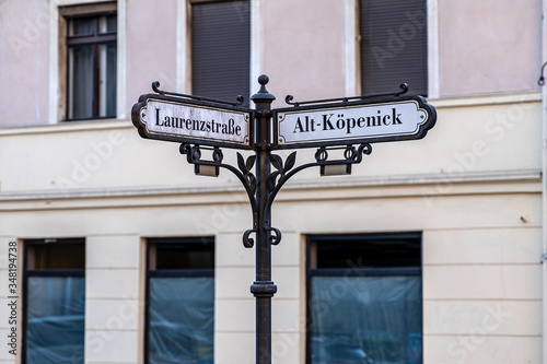 Vintage retro street sign in old town city center Köpenick Berlin, Germany