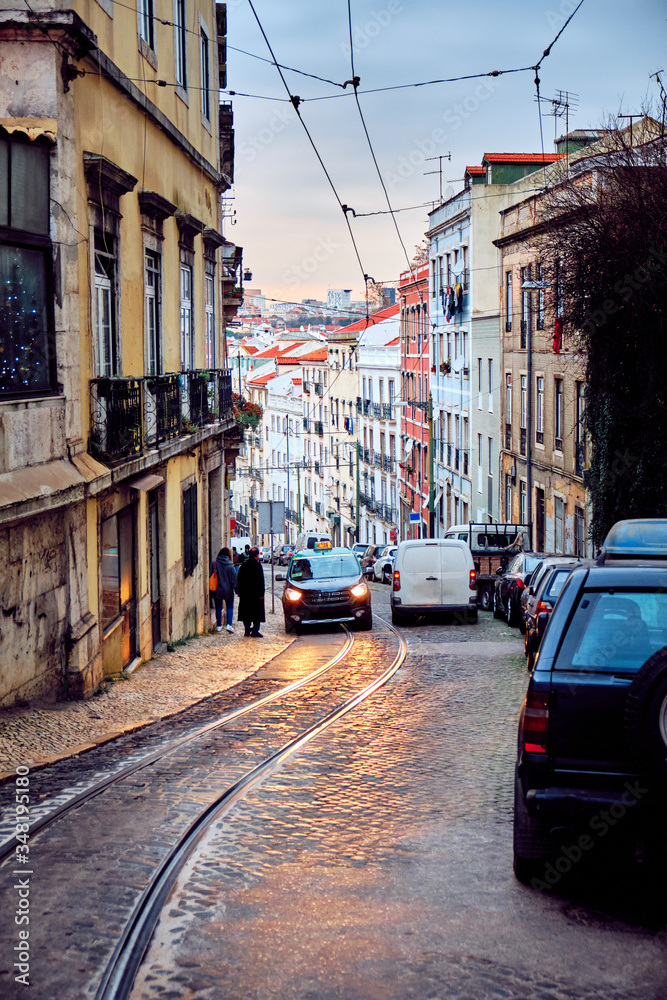Lisbon, Portugal. Street with rails. City landscape.