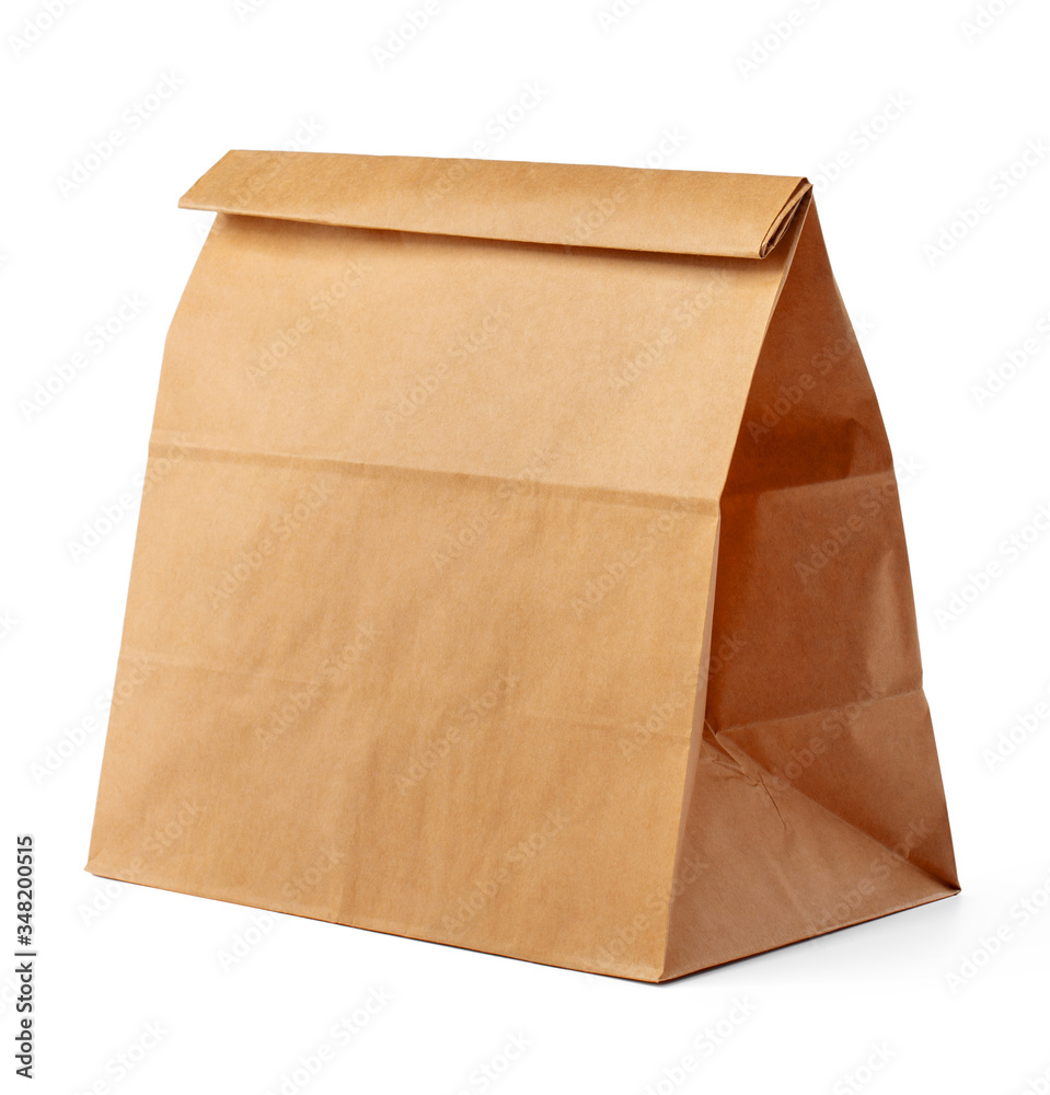 Brown craft paper bag packaging template on white background close up Brown craft paper bag packaging template on white background close up
