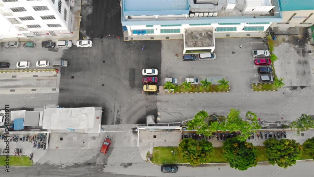 Car Entering Factory Car Park Through Guard House, Pedestrian Walking by - Moving Left-Side Car Entering Factory Car Park Through Guard House, Pedestrian Walking by - Moving Left-Side