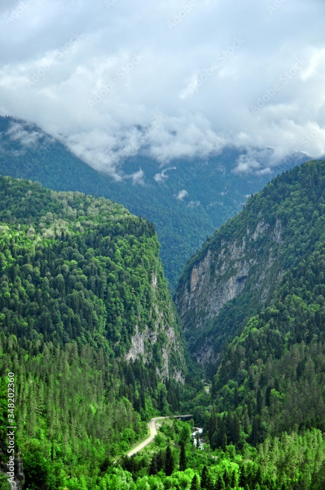 mystic mountain landscape with clouds