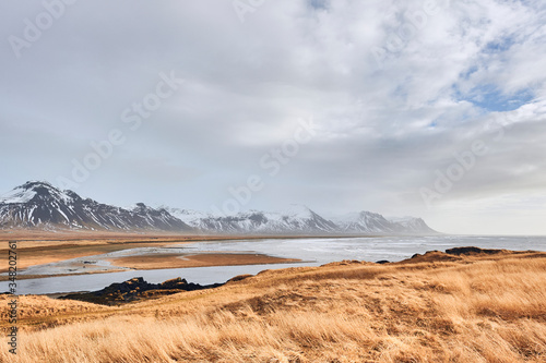Fototapeta Naklejka Na Ścianę i Meble -  View of coastline and mountains near Budir in Snaefellsnes peninsula (region of Vesturland, Iceland)