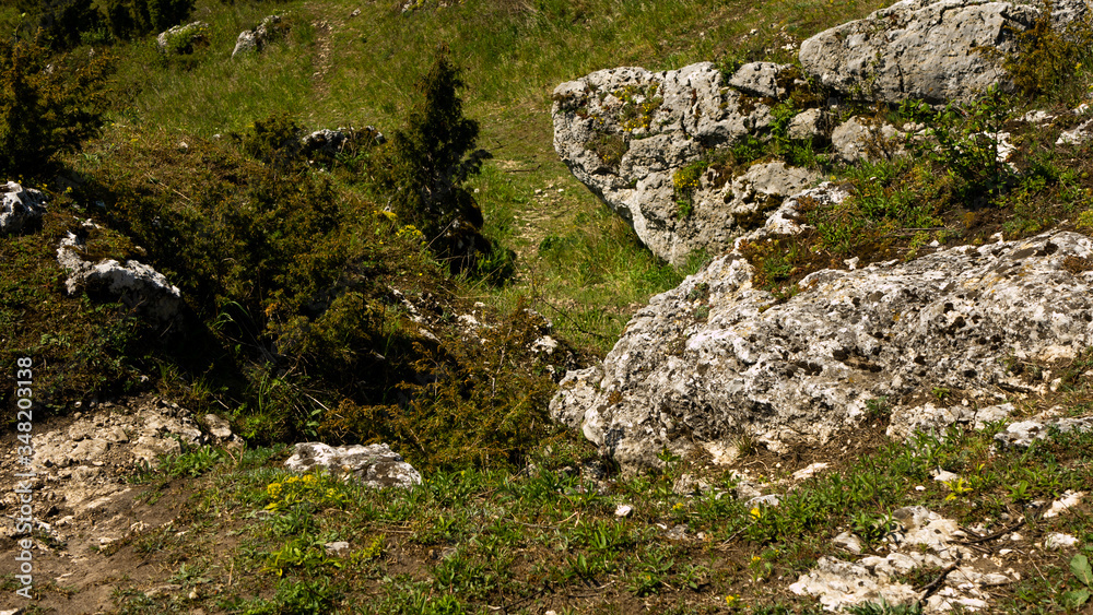View of the Sokolich Mountains Reserve and rock stones in Olsztyn. A free space for an inscription View of the Sokolich Mountains Reserve and rock stones in Olsztyn. A free space for an inscription