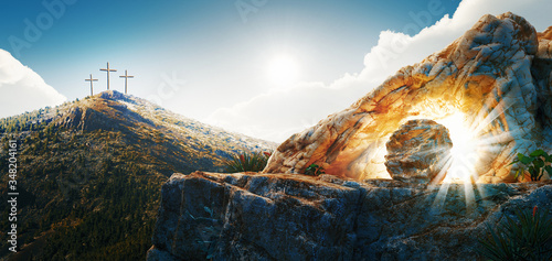 High resolution. Easter Sunday concept: Empty tomb stone with cross on meadow sunrise background. 3d rendering