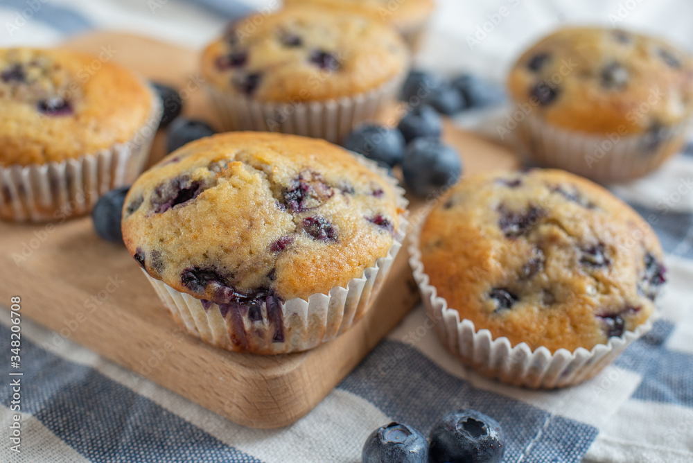 home made sweet blueberry muffin on a table home made sweet blueberry muffin on a table