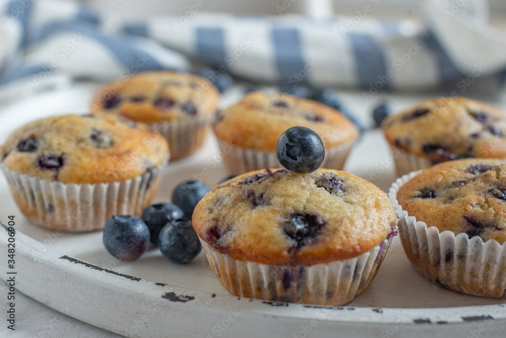 home made sweet blueberry muffin on a table home made sweet blueberry muffin on a table