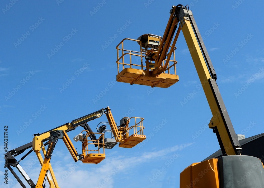 Back side of an aerial work platform, with other three in front of it. Back side of an aerial work platform, with other three in front of it.
