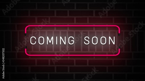 Coming Soon neon sign. white and blue glow. neon text. on brick wall background