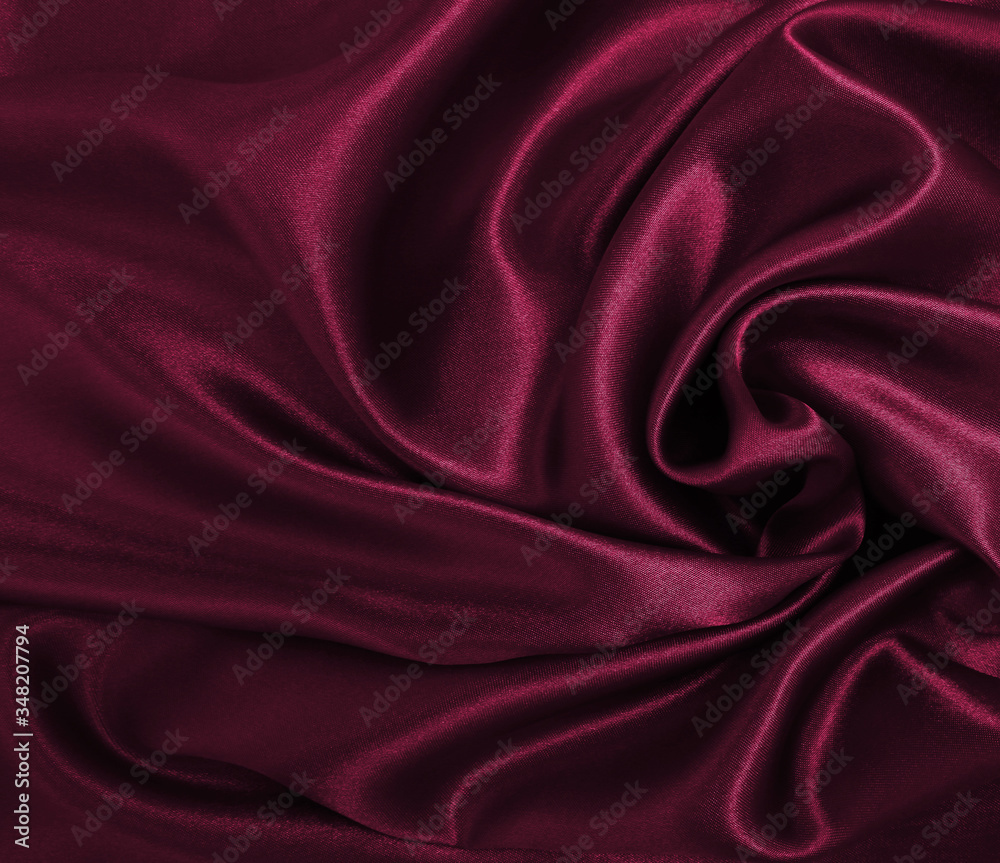 Smooth elegant pink silk or satin luxury cloth texture as abstract background. Luxurious background design Smooth elegant pink silk or satin luxury cloth texture as abstract background. Luxurious background design