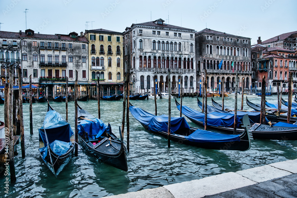 roads and canals in venice italy without crowds in dull weather with traditional gondolas