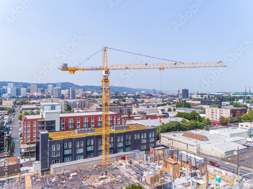 Obraz na płótnie Crone Working on New High Rise Construction Condo in Portland Oregon