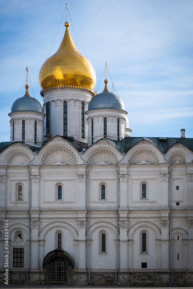 Beautiful white ancient church with golden domes in Moscow, Russia.