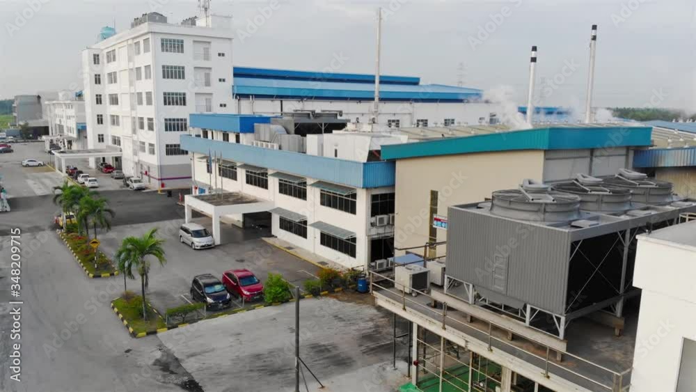 Parking Lot Side View Of A Factory - Pedestal Upwards Parking Lot Side View Of A Factory - Pedestal Upwards