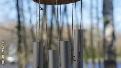 Hanging bell wind chime close-up from top to bottom