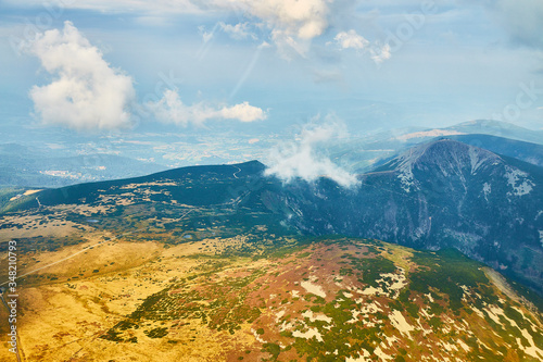 Summer aerial view of Snezka mountain summit in Krkonose mountains, Czechia/ Poland.