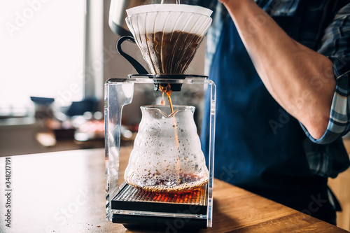 Man prepares coffee in style 