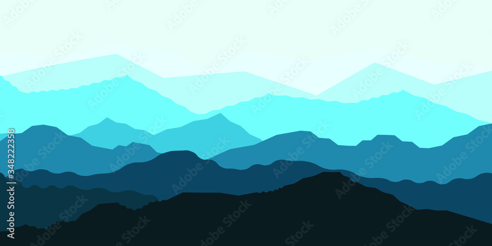 Panorama of the mountain. Blue silhouettes in aerial perspective.