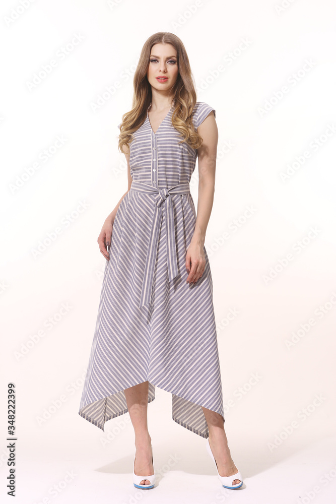 Fototapeta premium business woman executive in summer casual print maxi dress full body photo