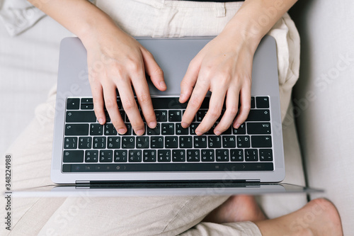 Attractive asian female working with computer laptop at home. Analyzing online data to success business