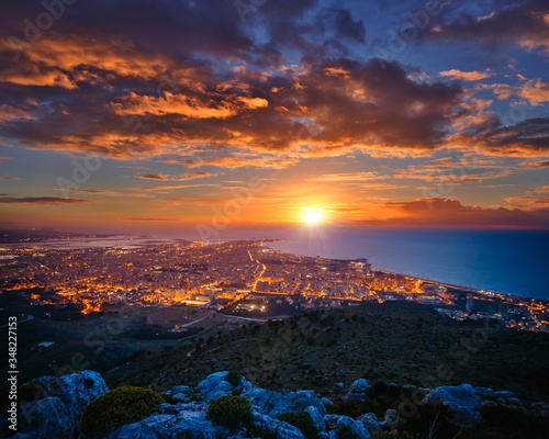 Top view above the city illuminated with lights. Location Trapani town, Sicily, Italy, Europe.