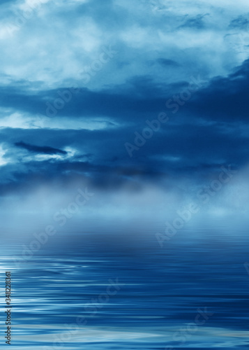 Background of night sea landscape. Night sky, clouds, full moon. Reflection of the moon on the water. Sunset on the sea horizon. Blue tinted blurred background. © Laura Сrazy