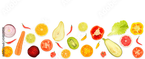 Halves of fresh vegetables and fruits isolated on white background.