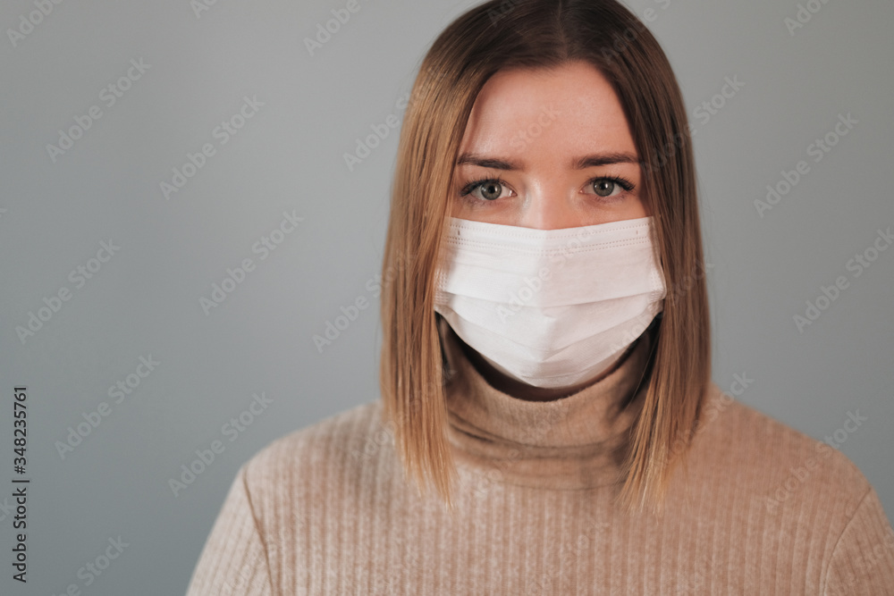 Portrait of One Beautiful Girl in White Medical Mask Portrait of One Beautiful Girl in White Medical Mask