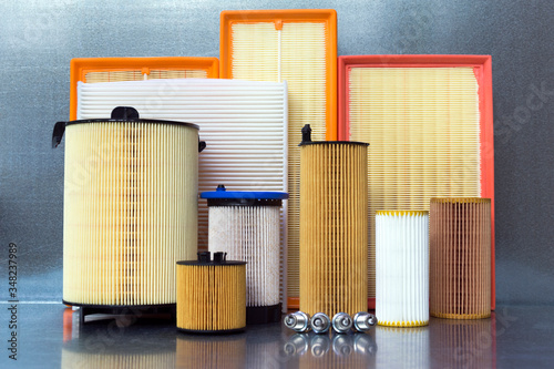 Car spare parts close-up on a steel background. Car filters.